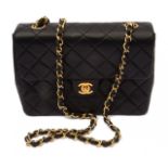 A Chanel black quilted lambskin mini flap 1989 handbag