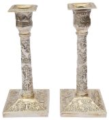 A pair of late 19th century Indian Colonial silver candlesticks