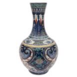 An early 19th c. Chinese clobbered blue and white Ming style bottle vase