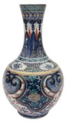 An early 19th c. Chinese clobbered blue and white Ming style bottle vase