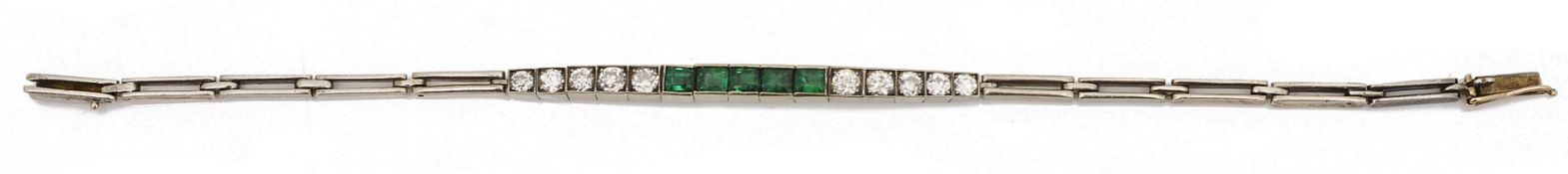 A Russian early 20th c. emerald and diamond flexible line bracelet,