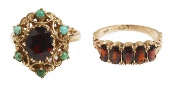 Two 9ct gold mounted garnet set dress rings