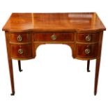 An Edwardian Sheraton style mahogany and inlaid dressing table,