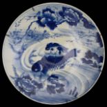 A large late 19th c. Japanese blue and white Arita porcelain charger