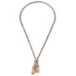 A vintage Hermes gold and silver tassel necklace