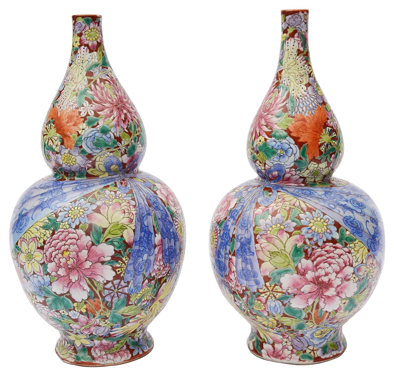 A pair of Chinese famille rose millefleur double gourd vases