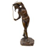 An early 20th century French patinated bronze of a harlequin