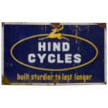 A vintage Hind Cycles enamel sign