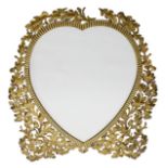 An Edwardian brass heart shaped easel back mirror