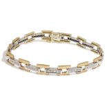 A 9ct white and yellow gold diamond set fancy link bracelet