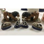Three pairs of Staffordshire pottery animal figures,