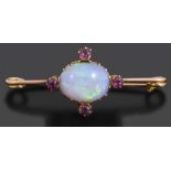 An late Victorian precious opal and garnet set brooch