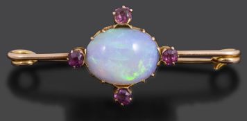 An late Victorian precious opal and garnet set brooch