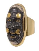A fine Japanese shakudo mask kashira mounted as a ring
