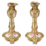 A pair of late 19th c. Fr. ormolu mounted porcelain candlesticks