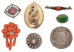A Victorian coral drop brooch and six other brooches