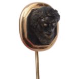 An unusual carved labradorite and rose diamond set stick pin