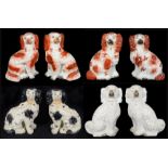 Four pairs of 19th century and later Staffordshire pottery dogs,