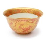 A Chinese porcelain coral ground and gilt decorated 'Kinrande' style deep bowl