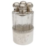 A late 19th c. Fr. silver and engraved glass four bottle perfume set