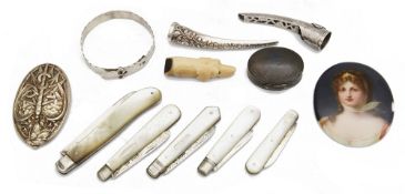 An interesting collection of silver vertu to include two Chinese silver finger nail guards; others