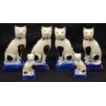 Three pairs of 20th century Staffordshire pottery cats,