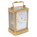 Mid 19th c. Fr. engraved gilt brass case carriage clock by Auguste, Paris c.1845