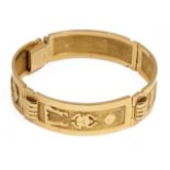 An Egyptian yellow metal hieroglyph panel bracelet