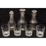 A set of four Victorian 'Last Drop' whisky tumblers c.1870 and three early 19th c. decanters