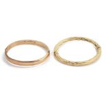 Two 9ct gold stiff bangles