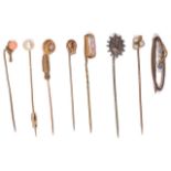 A Victorian opal set trefoil stick pin and a collection of other stick pins
