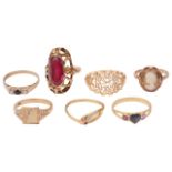 A sapphire and ruby set heart ring and a collection of gem set dress rings