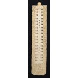 A late 19th century Chinese Canton export carved ivory cribbage board,