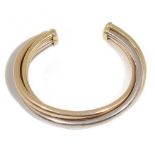 A Cartier three colour gold Trinity open bangle