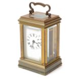 An early 20th century brass miniature carriage clock
