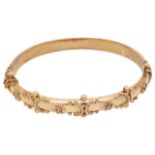 A Victorian 9ct gold stiff bangle