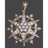 A late Victorian opal set star pendant brooch