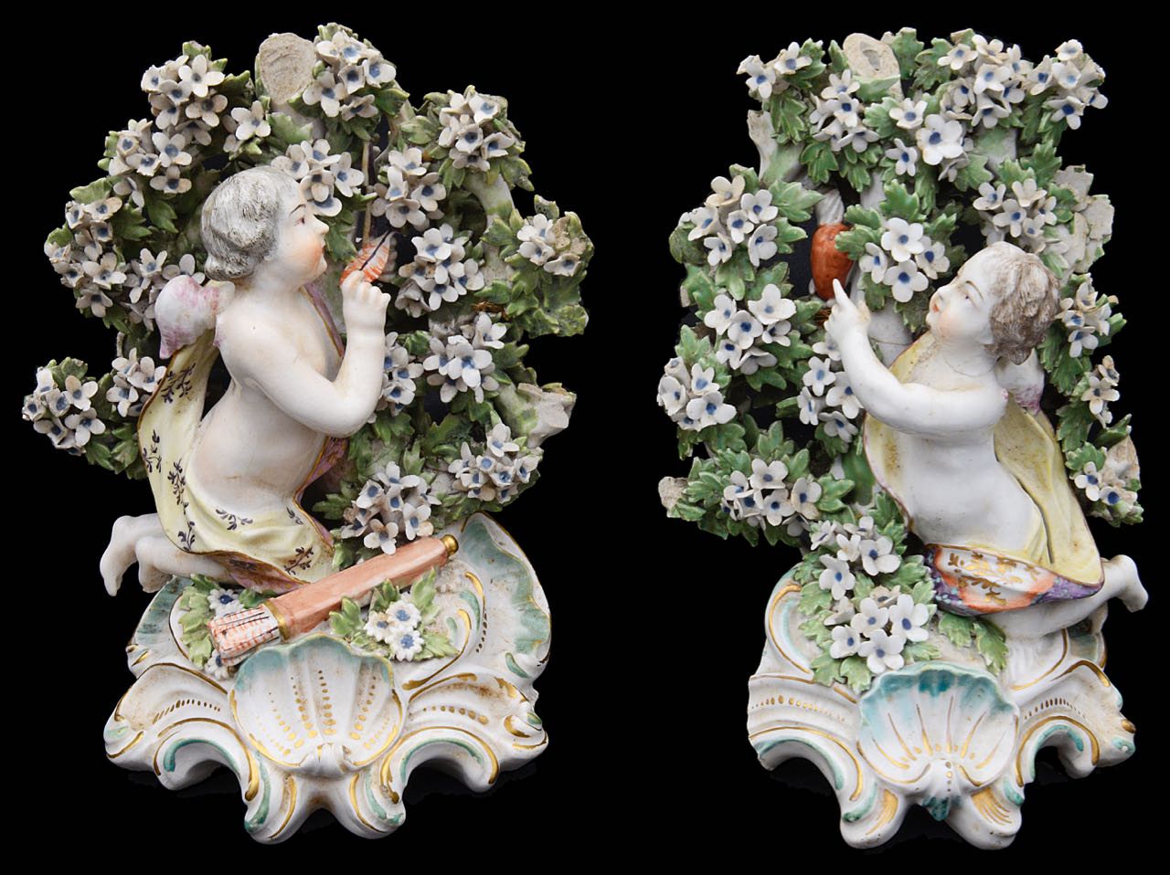 A near pair of late 18th century Derby figural bocage candlesticks