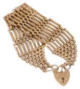 A contemporary 9ct gold eight bar gate bracelet