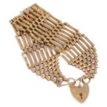 A contemporary 9ct gold eight bar gate bracelet