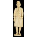 An early 19th c. Dieppe ivory needle case carved in the form of a fisherman,