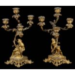 A pair of 19th c. Fr. Rococo ormolu figural four light candelabra