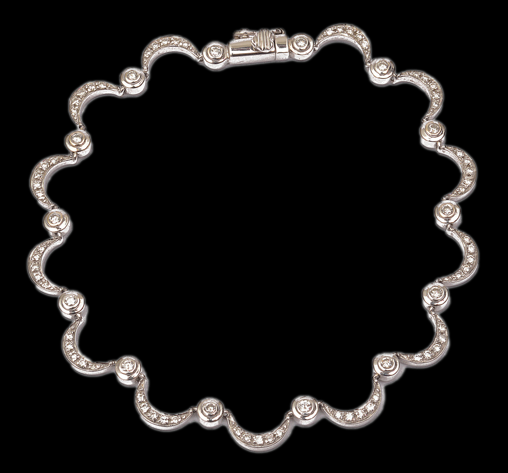 A delicate white gold and diamond set bracelet