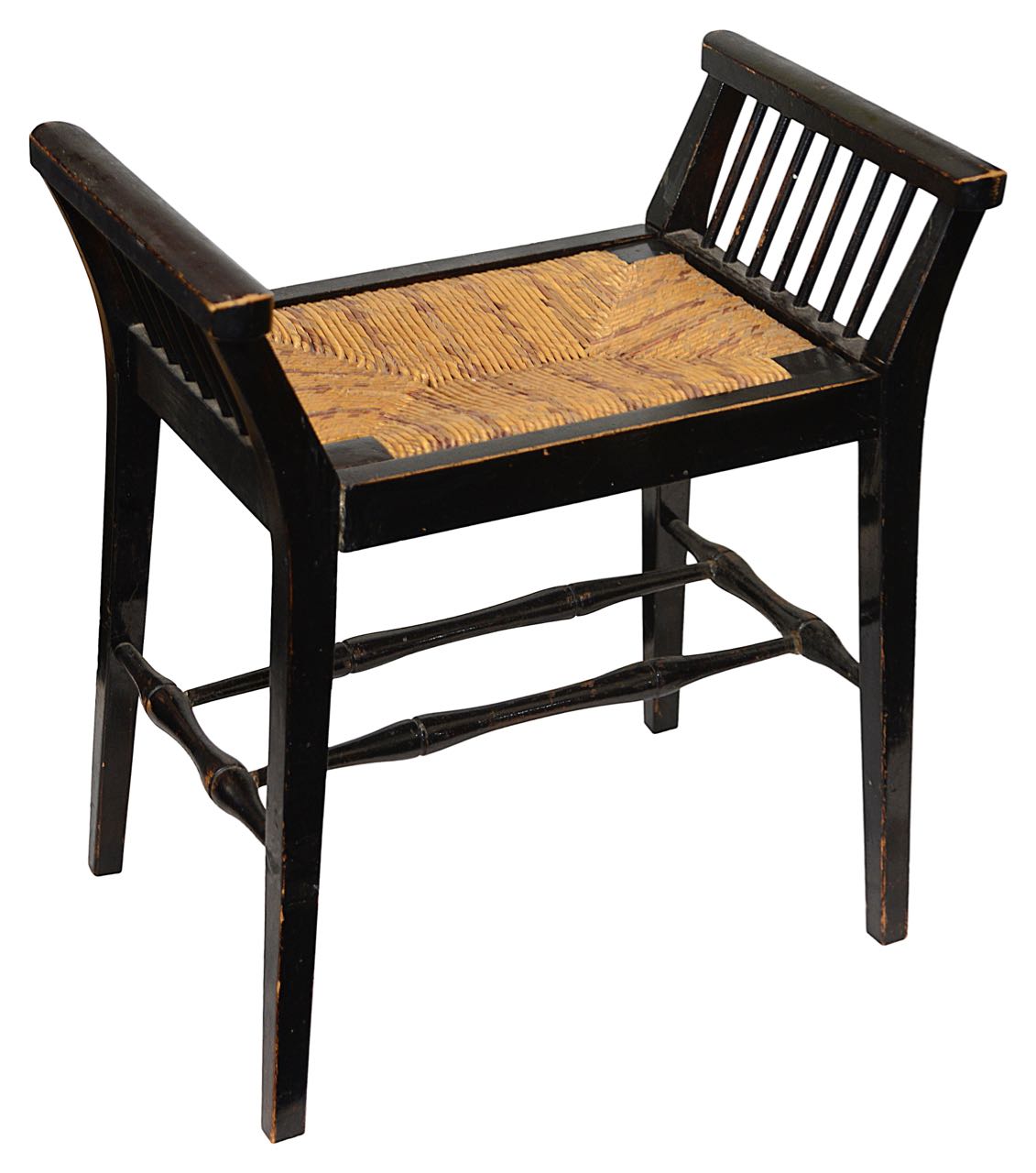 An Arts and Crafts ebonised beechwood stool in the style of Morris & Co