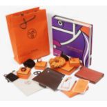 A collection of Hermes accessories