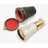 A 19th century French brass and mother of pearl monocular,