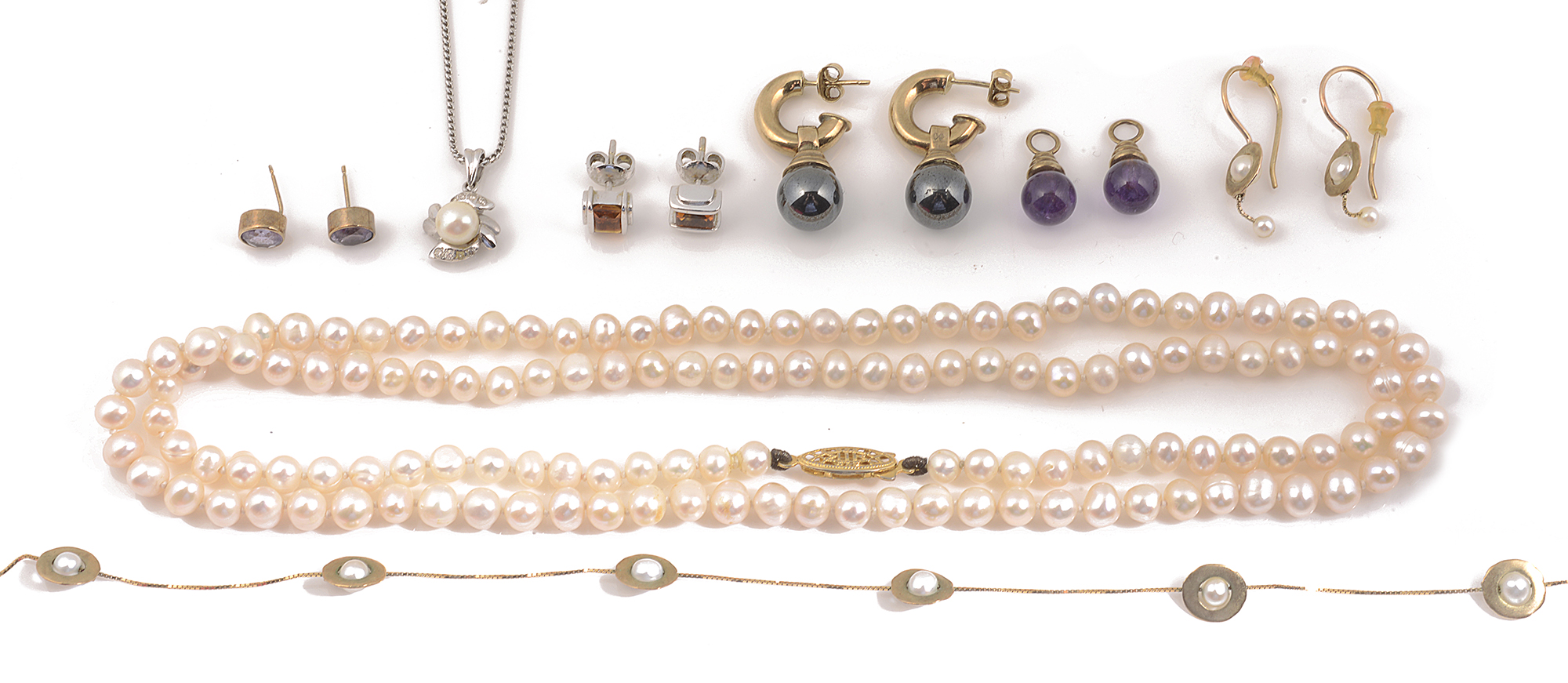 A small collection of contemporary gold and gem jewellery