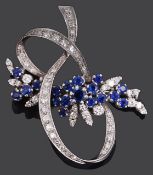 A mid 20th c. Continental sapphire and diamond set cocktail brooch