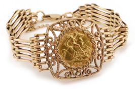 A 9ct gate bracelet with mounted half sovereign