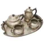 A Liberty & Co 'Tudric' hammered pewter five piece tea service Attrib. to Archibald Knox c.1905
